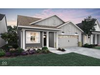 Charming single-story home with gray siding, a two-car garage, and well-maintained landscaping at 19499 Mcbee Ave, Westfield, IN 46074