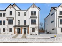 Beautiful new construction townhome with a modern farmhouse design and covered entryways at 7070 Nine Penny Dr, Brownsburg, IN 46112