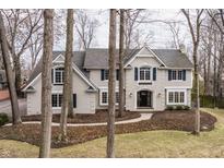 Beautiful two-story home exterior featuring a classic design with well-manicured lawn at 8001 N Illinois St, Indianapolis, IN 46260