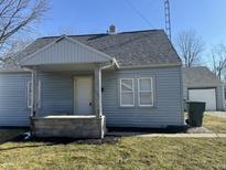 Charming single-Gathering home with covered front porch and well-maintained lawn at 1624 S Jersey Ave, Muncie, IN 47302