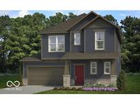 Charming two-story home featuring blue siding, a covered porch, and a well-manicured lawn with colorful flowerbeds at 13383 Vickery Ridge Dr, Fishers, IN 46037