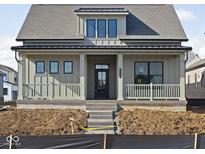 Charming home featuring a covered front porch with classic column supports at 17364 Pinellas Ave, Westfield, IN 46074