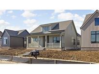 Charming craftsman-style home with a welcoming front porch and landscaped yard at 17364 Pinellas Ave, Westfield, IN 46074