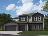 Two-story home with a three-car garage, beautiful windows, dark gray brick, and dark shingles at 6019 Granby Dr, Whitestown, IN 46075