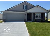 Charming single-story home featuring a neutral-toned exterior and a well-maintained lawn at 6635 Sulgrove Pl, Indianapolis, IN 46221