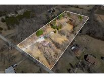 Expansive aerial view shows home with a large lot surrounded by mature trees at 2305 Bill Smith Rd, Martinsville, IN 46151
