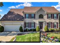 Charming two-story home featuring a brick facade, well-manicured lawn, and an attached two-car garage at 12396 Dellfield W Blvd, Carmel, IN 46033