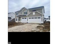 Newly constructed two-story home featuring a two car garage and horizontal siding at 3707 Thomas Jefferson St, Westfield, IN 46074