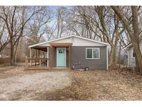 Charming single-story home featuring a covered porch and a freshly painted exterior, perfect for curb appeal at 4629 Indianola Ave, Indianapolis, IN 46205