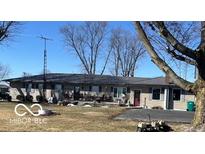Ranch style home with a metal roof and large front yard at 4823 S State Road 75, Jamestown, IN 46147