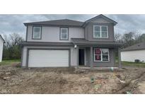 New two-story home with gray siding, a two-car garage, and classic architectural details at 3328 Stafford St, Sheridan, IN 46069
