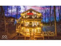 Stunning multi-level lake house with multiple decks, providing ample outdoor living space at 8205 Bass Dr, Nineveh, IN 46164