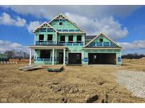 New two story home construction showing framing and wrapped exterior on a sunny day at 2260 Oakmont Dr, Plainfield, IN 46168