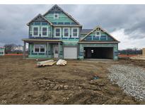 Two story home featuring an attached 2-car garage under construction on a cloudy day at 2260 Oakmont Dr, Plainfield, IN 46168