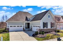 Charming home with a three-car garage, well-manicured lawn, and inviting curb appeal at 3331 Adare Cir, Westfield, IN 46062