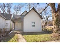 Cozy home featuring neutral siding and a covered front porch entry at 1149 W 28Th St, Indianapolis, IN 46208