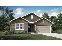 Charming single-story home featuring a two-car garage and nicely landscaped front yard at 11739 Vale St, Indianapolis, IN 46235