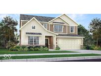 Charming two-story home featuring a two-car garage, neutral siding, and professionally landscaped front yard at 1232 Taggart Way, Greenwood, IN 46143