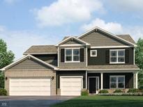 Inviting two-story home with a three-car garage and covered entryway and dark shutters at 2290 Oakmont Dr, Plainfield, IN 46168