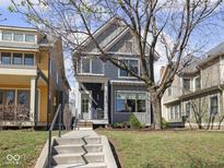 Charming two-story home with a well-maintained front yard and inviting entrance at 1838 Alabama St, Indianapolis, IN 46202