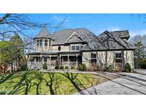Charming two-story home with a beautiful covered porch, perfect for relaxing outdoors at 3608 Olive Branch Rd, Greenwood, IN 46143