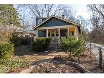 Charming home featuring a quaint front yard and a cozy covered porch at 5359 Sunset Ave, Indianapolis, IN 46208
