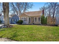 Charming single-story home with a well-maintained lawn and inviting curb appeal at 2603 E 58Th St, Indianapolis, IN 46220