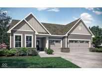 Charming single-story home features a gray exterior, attached garage, and well-manicured lawn and decorative landscaping at 5052 Astor Ct, McCordsville, IN 46055