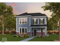 Charming two-story home with blue siding, black shutters, brick accents, and a well-manicured lawn at 12015 Jeff Ct, Noblesville, IN 46060