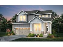 Charming two-story home featuring a modern facade, attached two-car garage, and professionally landscaped front yard at 2777 Penn Ave, Plainfield, IN 46168