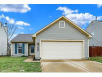 Charming single-Gathering home featuring a two-car garage, and inviting front yard at 3534 Fredricksburg Dr, Indianapolis, IN 46227