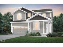 Charming two-story home with gray siding, white trim, a well-manicured lawn, and an attached two-car garage at 6818 Jacone Dr, Brownsburg, IN 46112