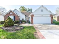 Charming single-story home featuring a well-manicured lawn, brick accents, and an attached two-car garage at 245 Suncrest Dr, Greenwood, IN 46143