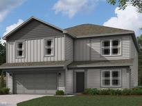 Charming two-story home featuring vertical siding, a gray roof, manicured lawn, and an attached two-car garage at 3296 W Longbranch Dr, Monrovia, IN 46157