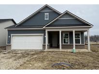 Charming single-Gathering home with a two-car garage and covered porch situated on a construction lot at 14859 Amber Light Dr, Westfield, IN 46074