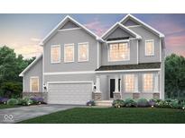 Beautiful two-story home featuring gray siding, a two-car garage, and manicured landscaping at 16467 Alps Rd, Noblesville, IN 46060