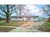 Inviting one-story home with a well-kept yard, providing comfort and classic charm at 1918 Syracuse Ct, Lebanon, IN 46052