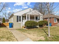 Charming single-story home with inviting front porch and well-maintained lawn at 4708 Crittenden Ave, Indianapolis, IN 46205