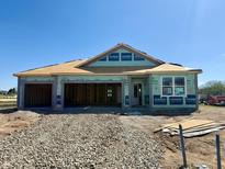 New construction home featuring a spacious garage, and durable sheathing at 5899 Doorbell Ln, Greenwood, IN 46143