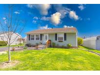 Attractive single-story home featuring a well-kept lawn and landscaped garden at 868 Glendale Dr, Franklin, IN 46131