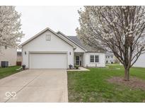 Charming single-Gathering home boasts an attached two-car garage and well-maintained landscaping at 14014 Keams Dr, Fishers, IN 46038