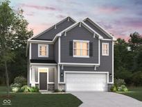 Charming two-story home with gray siding, white trim, and an attached two-car garage at 5133 Modernist Blvd, Indianapolis, IN 46237