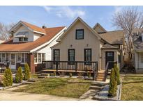 Charming home featuring a cozy front porch, well-maintained lawn, and inviting curb appeal at 2155 S Delaware St, Indianapolis, IN 46225