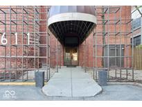 The building entrance has a stylish covered entry with an artistic, brick facade at 611 N Park Ave # 405, Indianapolis, IN 46204