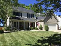Beautiful two-story home with well-maintained lawn and mature trees in a desirable neighborhood at 7336 Hardin Oak Dr, Noblesville, IN 46062