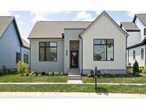 Charming single-story home with gray brick, white siding, black trim, and landscaped front yard at 17354 Newton Main St, Westfield, IN 46074