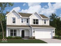 Charming two-story home with white siding, covered porch, and attached two-car garage at 16829 Silo Meadows Dr, Noblesville, IN 46060