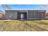Charming single-story home with gray siding, front lawn, and a welcoming front door at 3661 Yellow Poplar Ct, Indianapolis, IN 46222