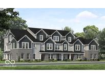 Beautiful townhome building featuring gray brick and vinyl siding with a dark roof and white trim at 5785 Cr W 750 N, McCordsville, IN 46055