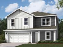 Two story home featuring a two car garage and gray and white siding at 3272 W Longbranch Dr, Monrovia, IN 46157